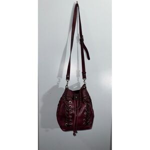 Patricia Nash Martina crossbody drawstring bag grommets and lacing burgundy red